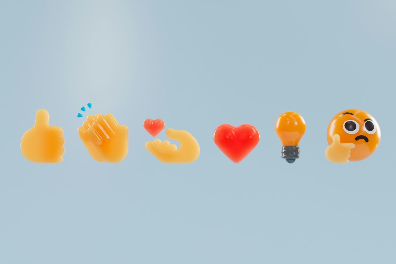 Various plastic emoji displayed horizontally