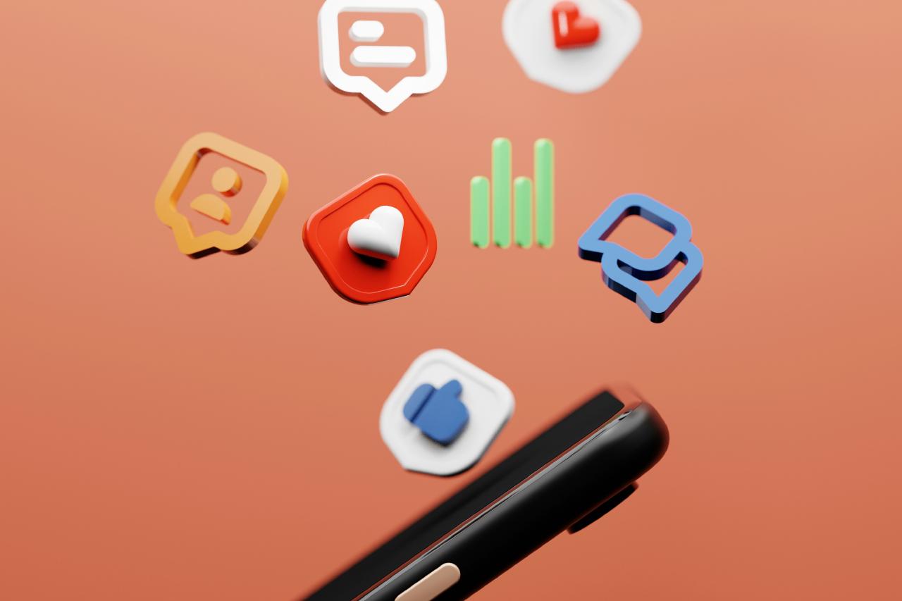 3D render of various social media icons floating around a smartphone.